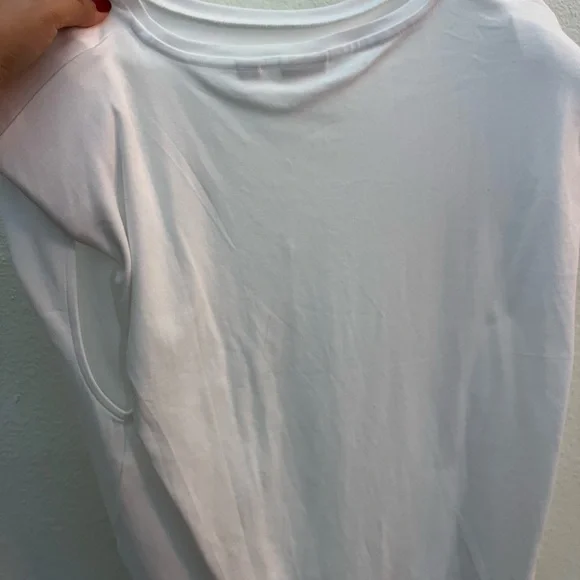 Aritizia white t-shirt with shoulder pads. Sold out online in medium! Worn once - Picture 3 of 6